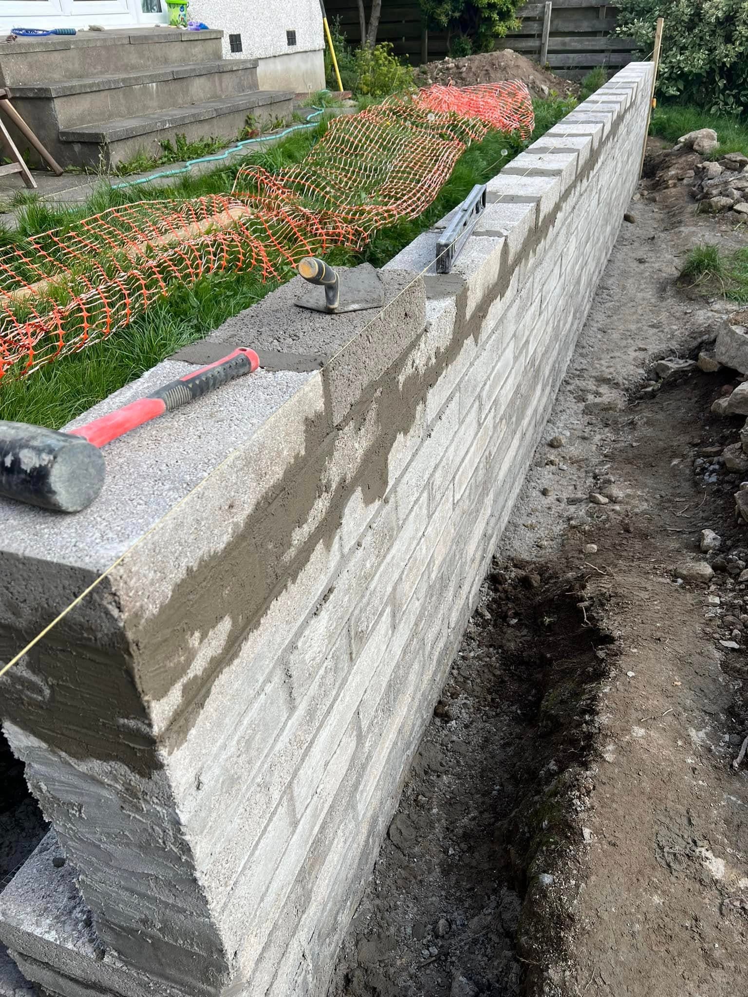 Brick retaining wall construction by Greenwell