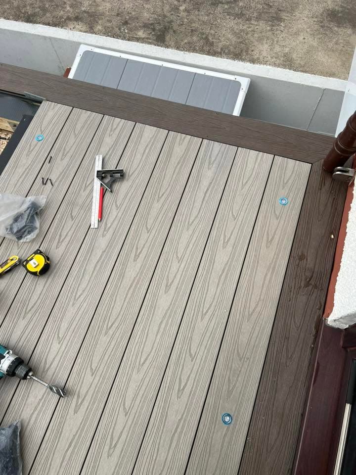 Composite decking build with glass balustrade by Greenwell