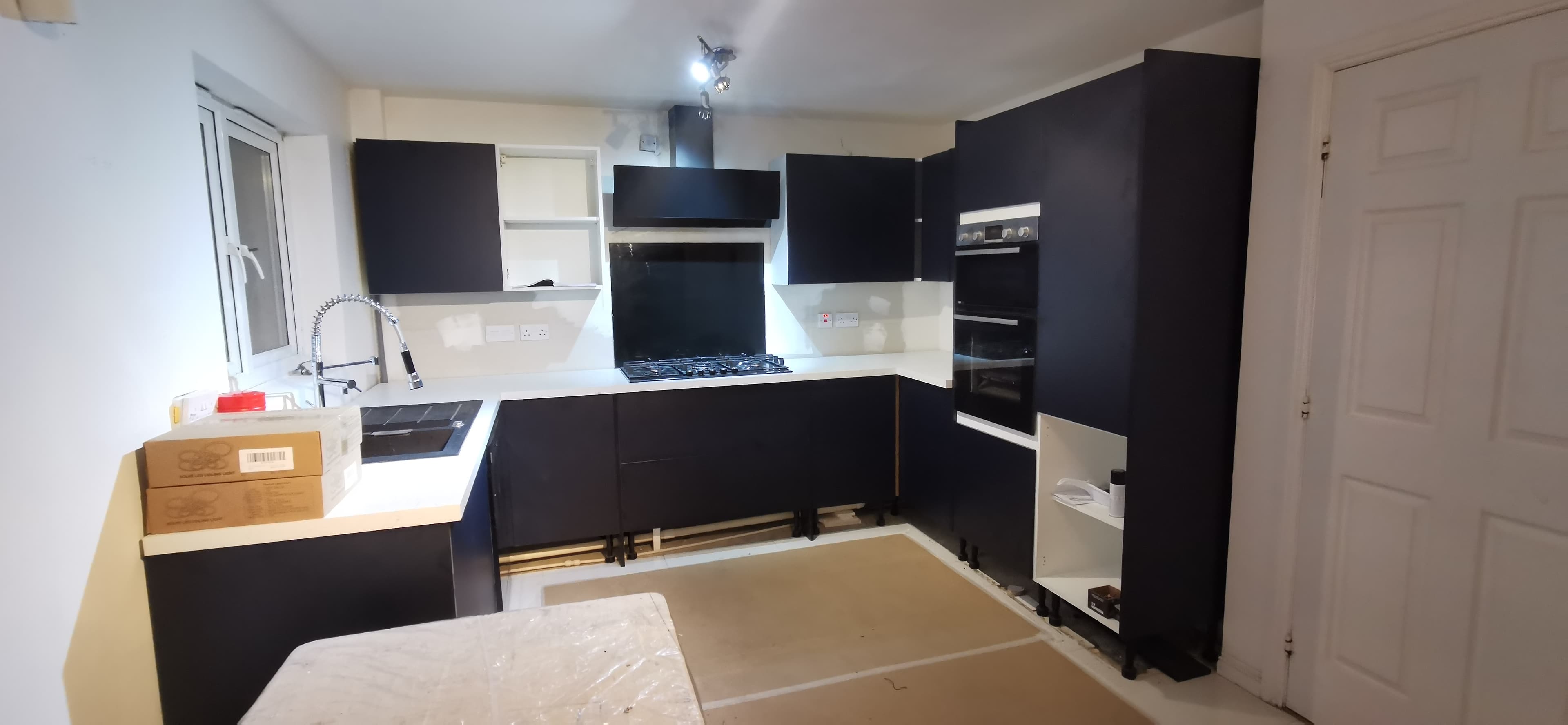 Completed kitchen install with matching wall and base units