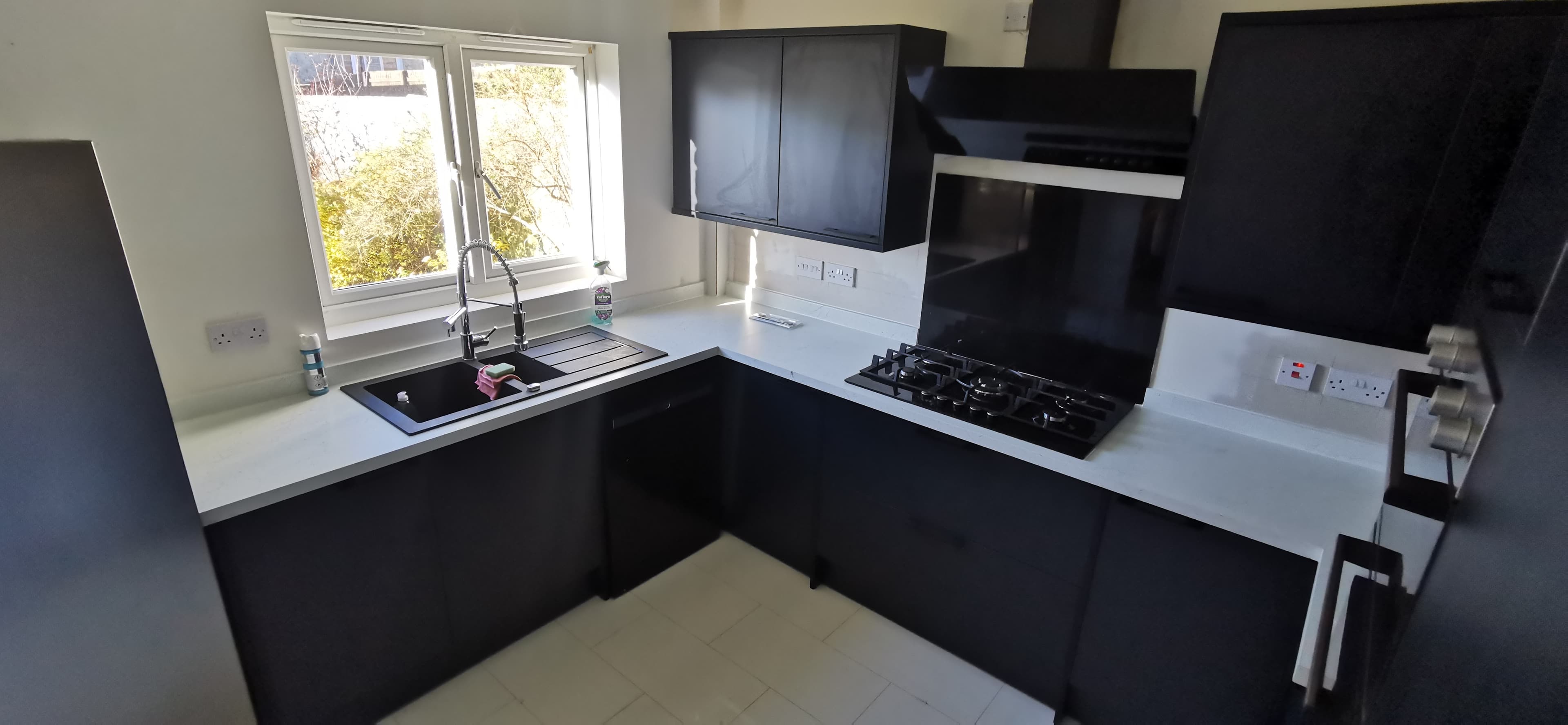 Completed kitchen install with matching wall and base units