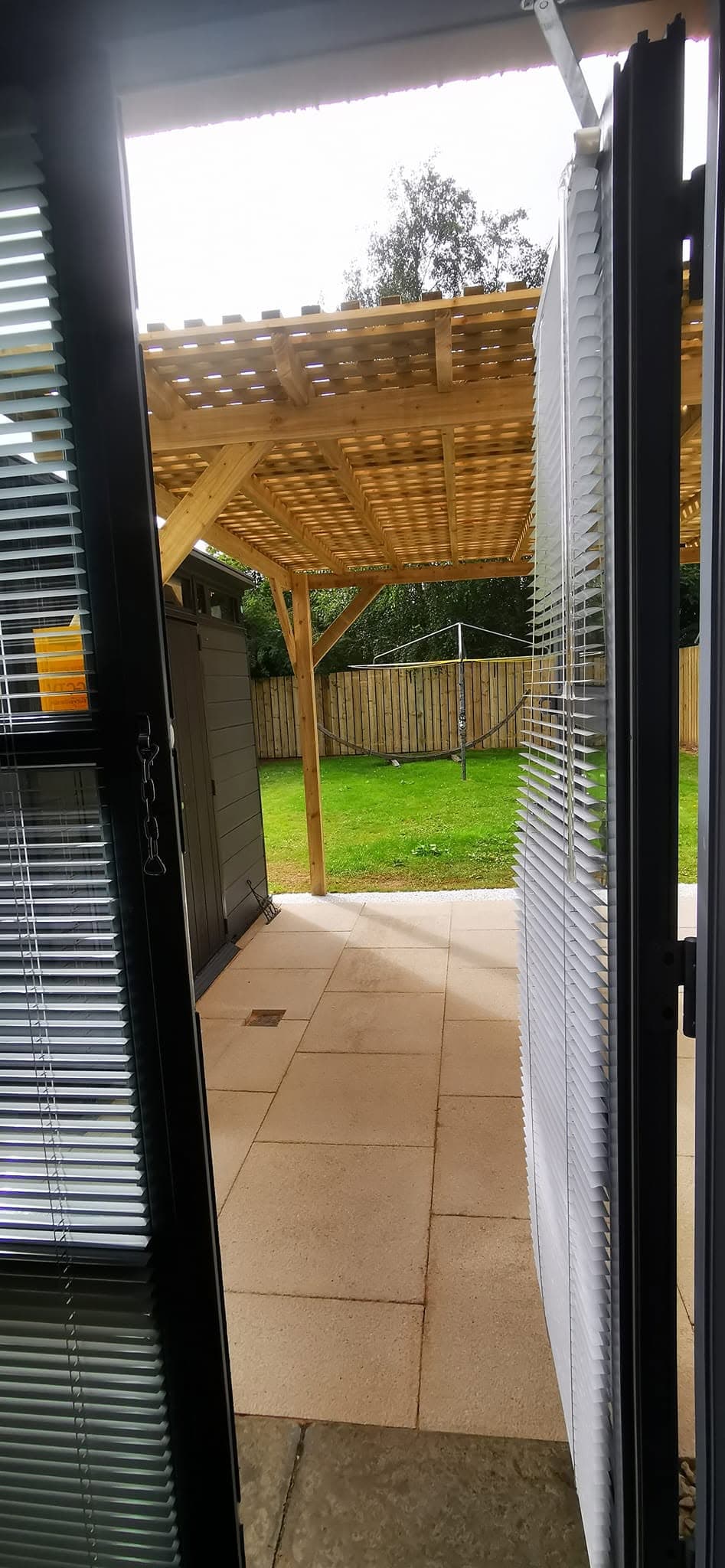 Completed garden landscaping with paving and planting borders
