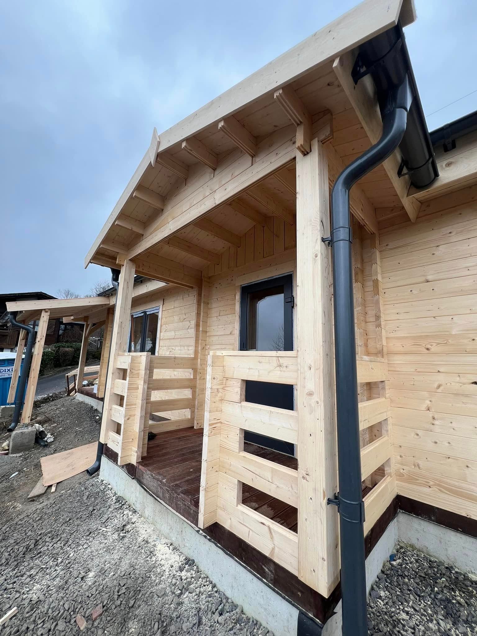 Log cabin exterior with covered veranda